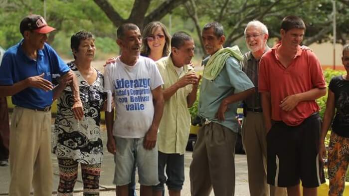 The visiting team of professionals and several locals gathered together.