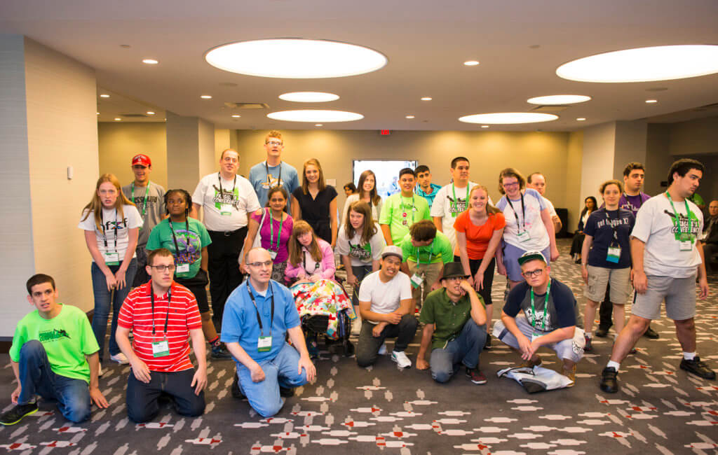 Sibling and self-advocate network poses for a picture at the NFXF International Fragile X Conference.