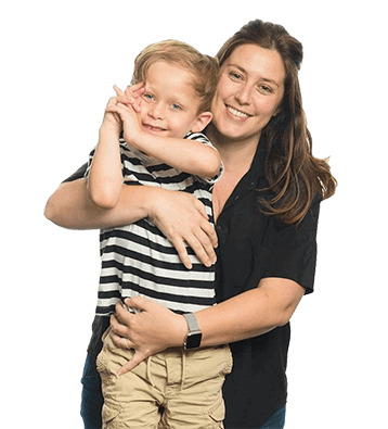 A mother holding her son who has Fragile X syndrome