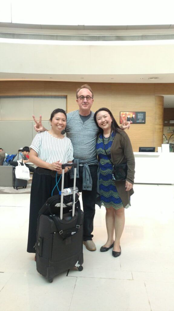 Robby Miller with two others in the Philippines for Fragile X