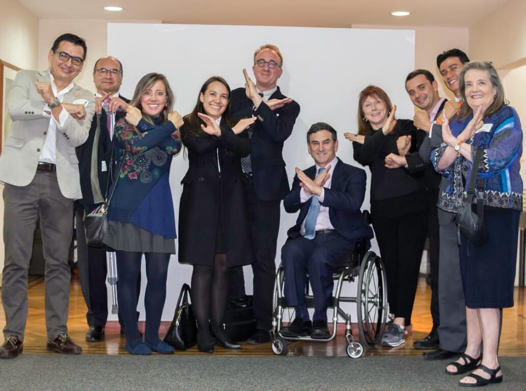 At the Colombian Presidential Compound in Bogota with Colombian Fragile X clinicians and researchers, parents, including leaders of the Asociación X Frágil Colombia, MIND Institute faculty and the Special Advisor on Disability Issues to the President of Colombia (seated).
