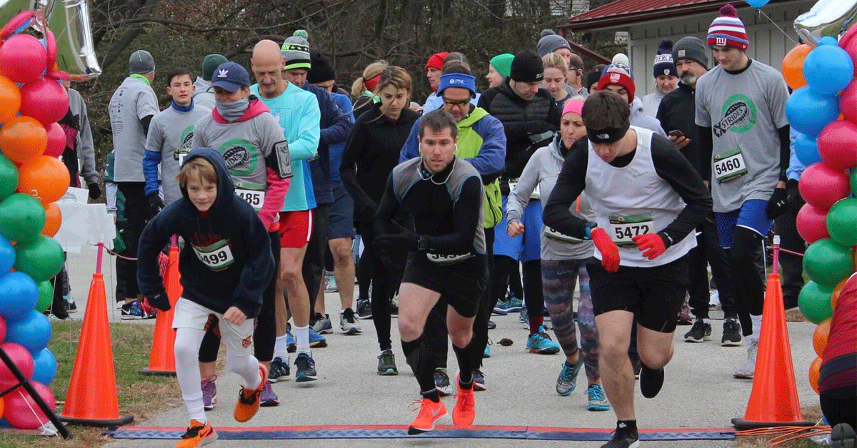 Runners leaving the starting gate.