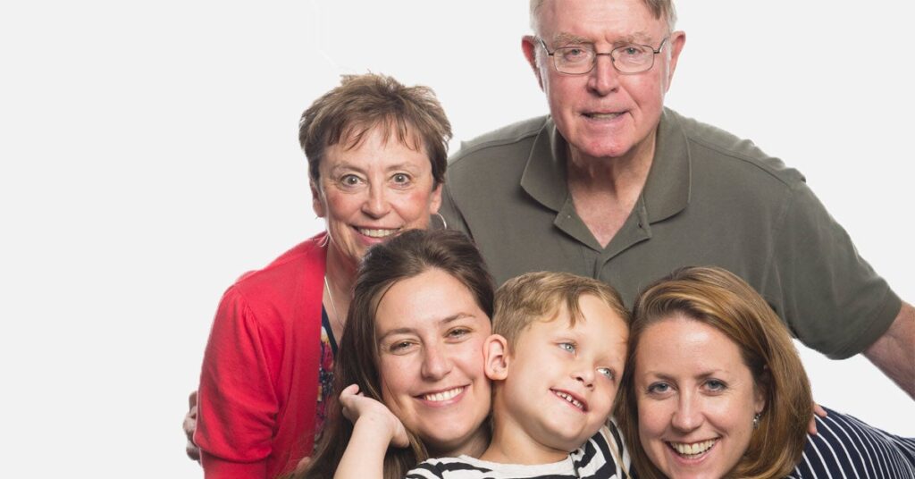 A family made up of four adults and one young child
