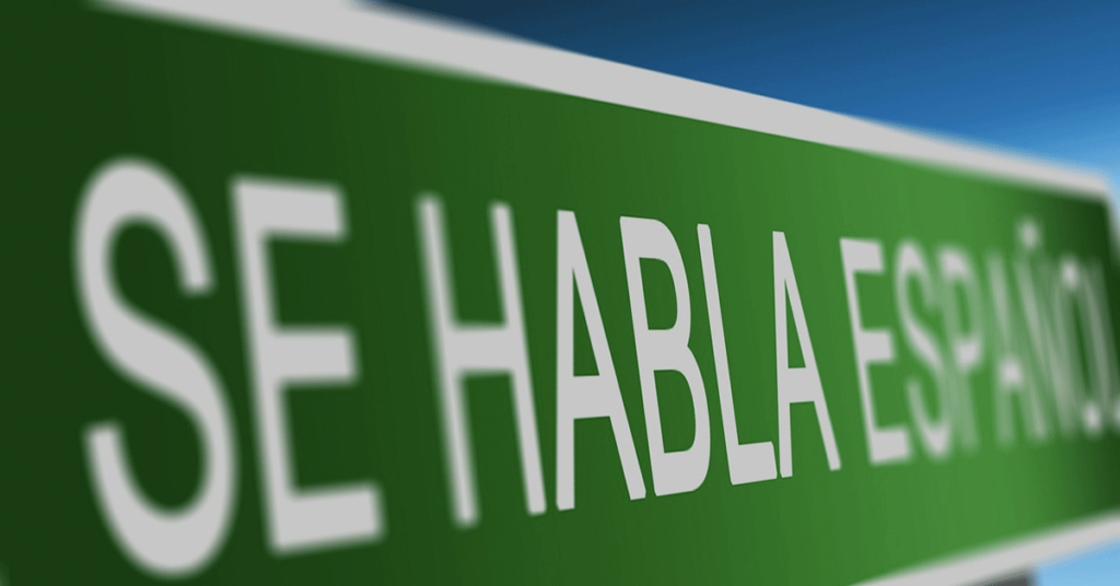 A sign reading Se habla espanol