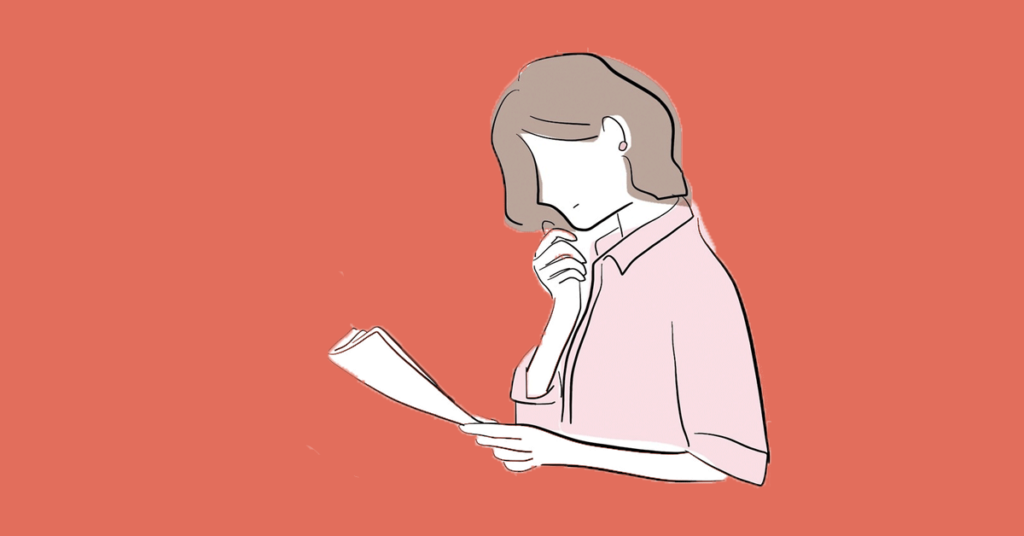 Woman reading a paper.