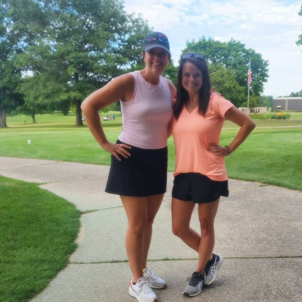 Two women golfers.