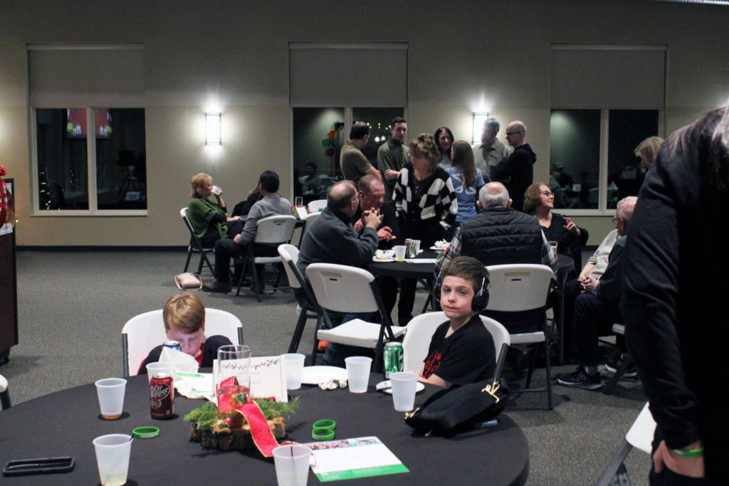 Guests enjoying the party.
