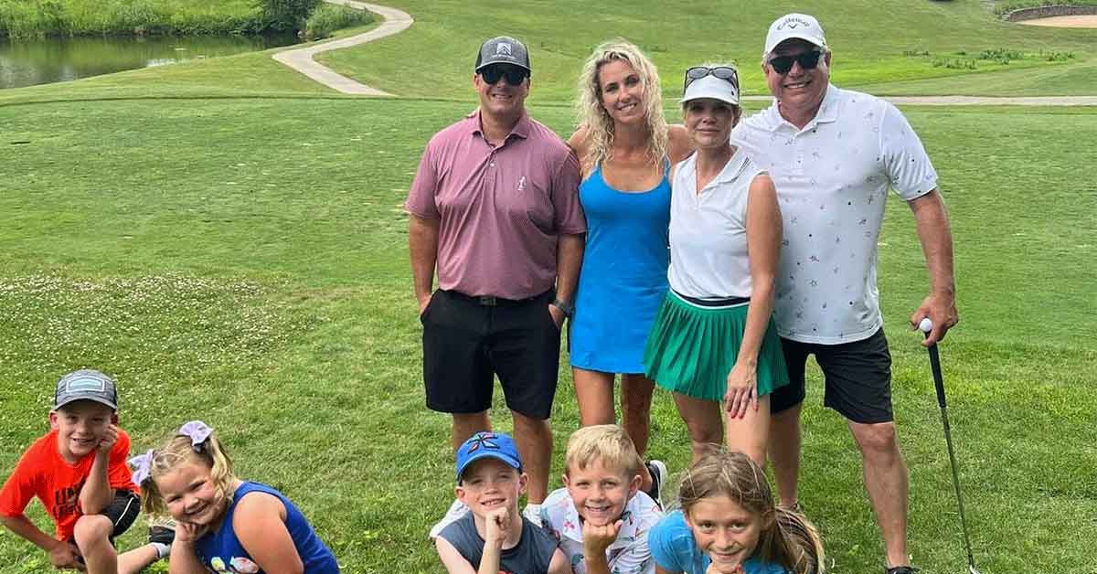 The Marner Family and guests on the golf course.