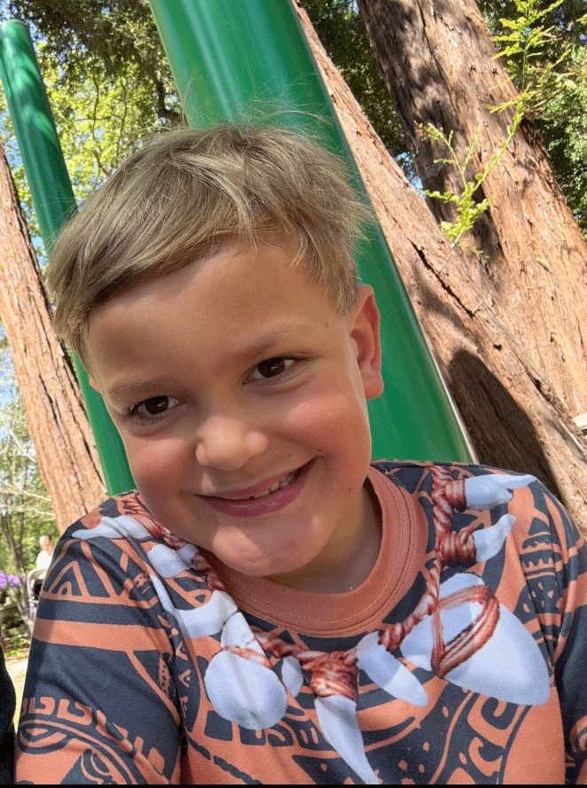 Kody Mirassou with a happy smile.