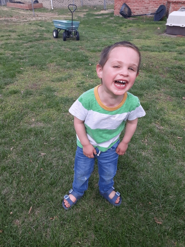 Cash Whiting outdoors with a gleeful expression!