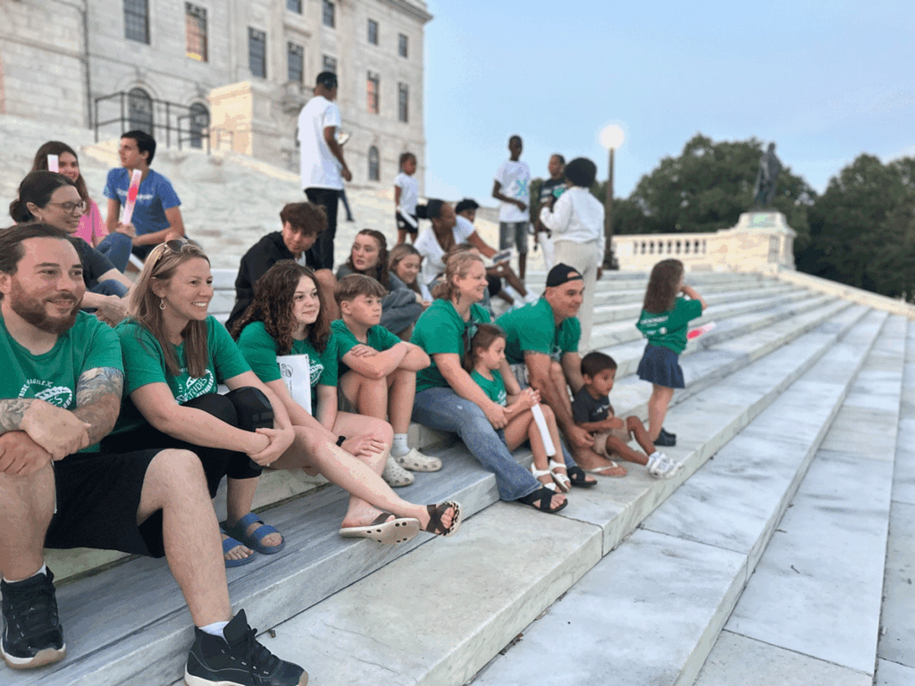 Little Rhody Warriors on the steps of the Rhode Island State House for Fragile X Awareness Day, wearing matching X-Strides tees!