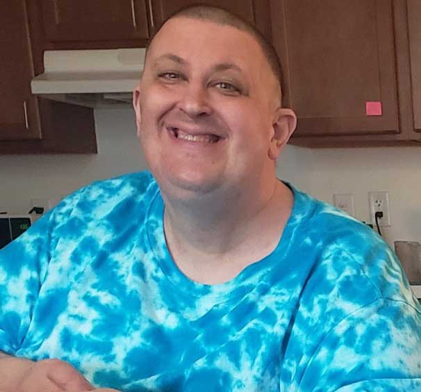 Jami Omahen at home in his kitchen.