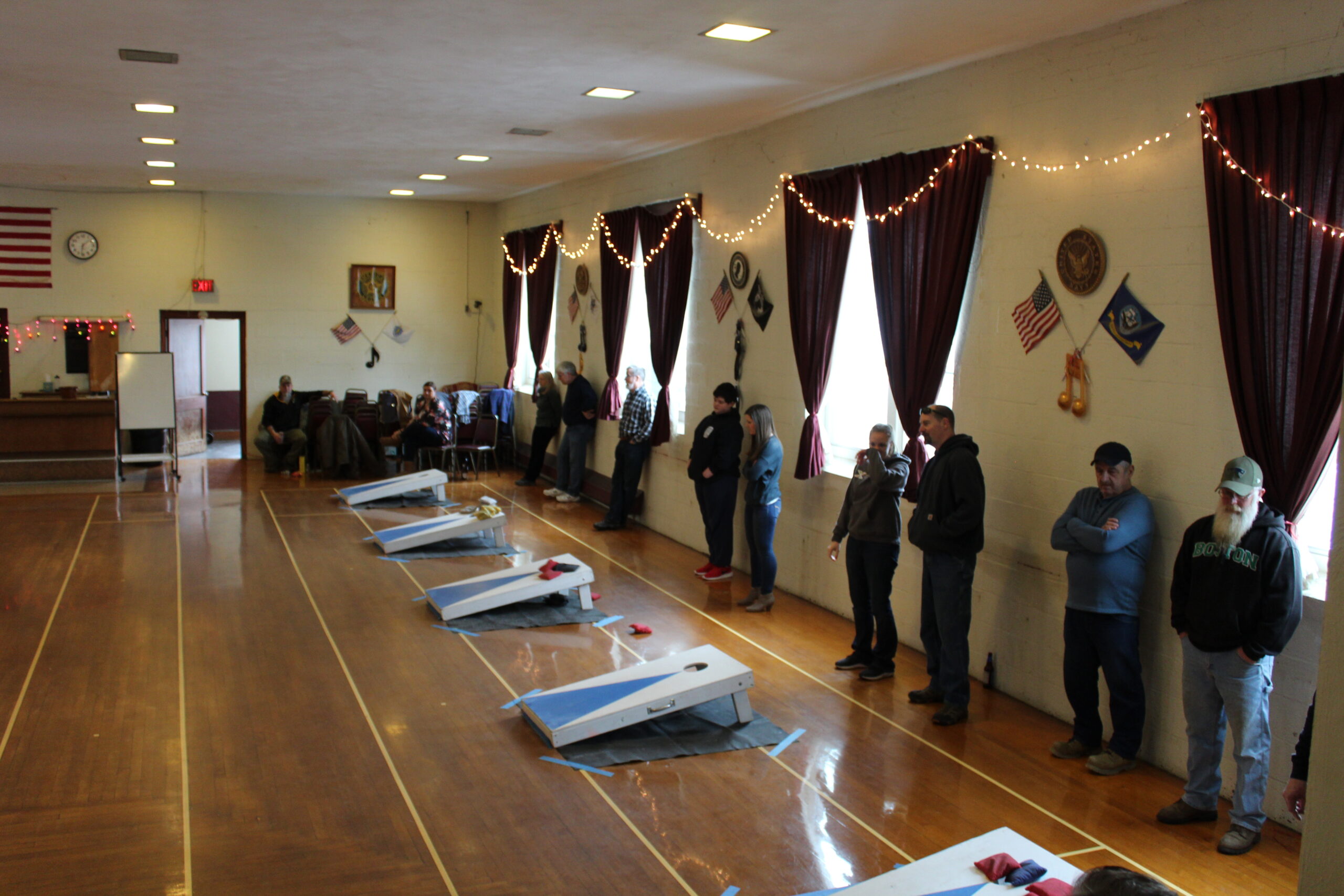 people playing corn hole