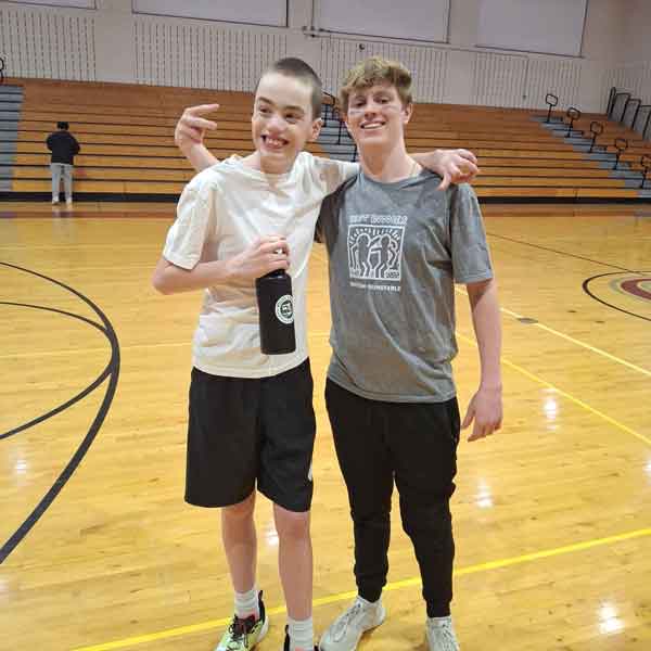 Jack and James on the basketball court.