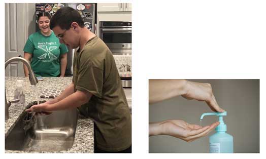 Young boy washing his hands while his mother looks on. A soap pump.