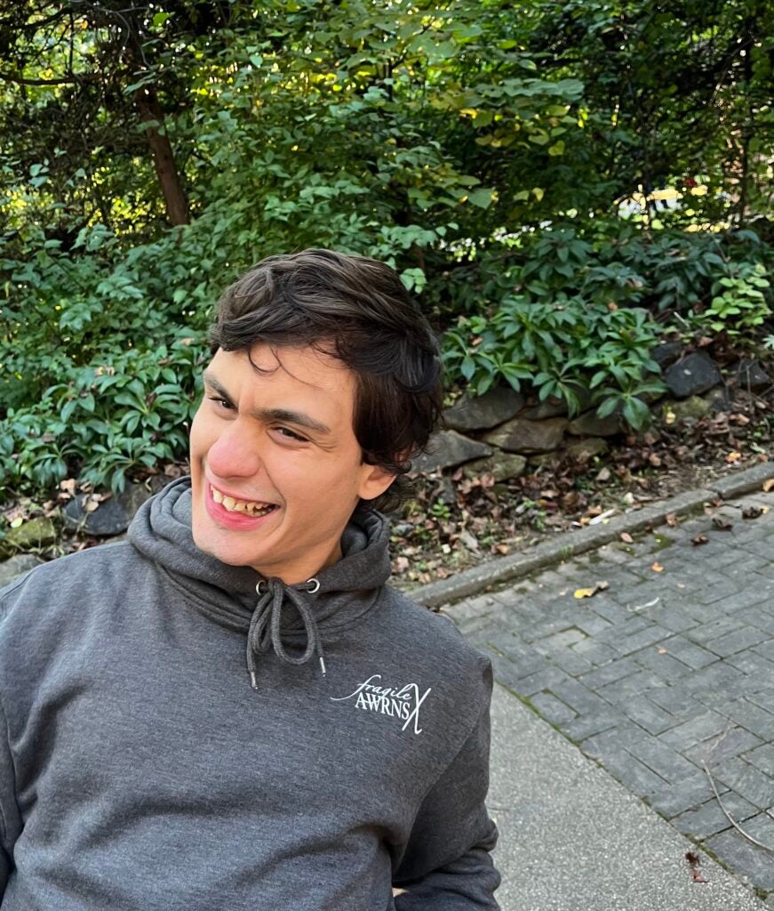 Filippo wearing Fragile X hoodie