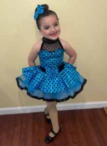 Alaina in a dance costume.