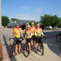 Nancy Carlson and other riders in the Heartland chapter Bike To X Out Fragile X fundraising event outside of Exile Brewing Co. in Des Moines, Iowa.