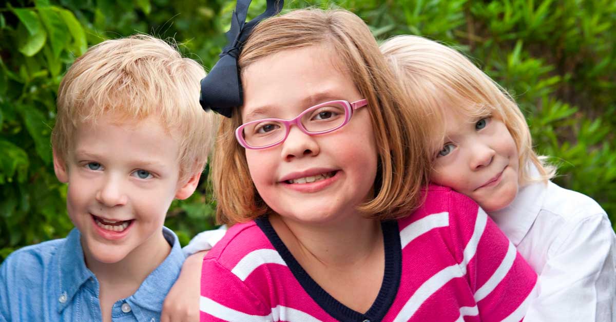 three children smiling