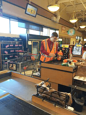 Bagger Ian working at the King Sooper checkout stand