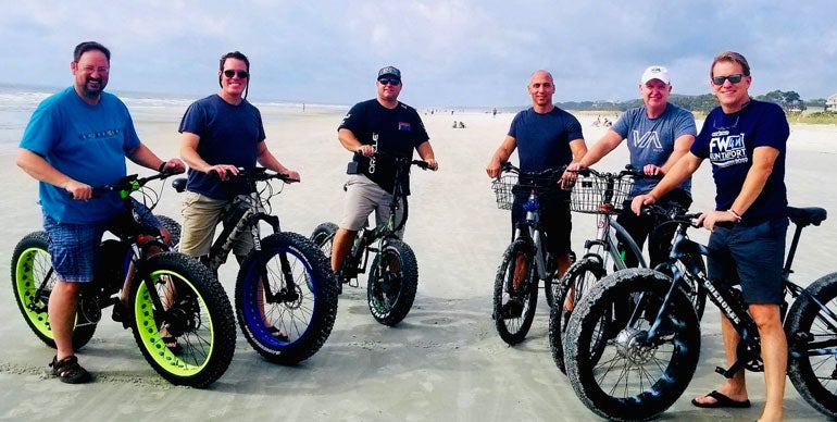 Six men riding beach bikes in Hilton Head, SC..
