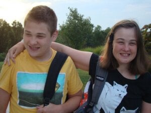 Brother and sister walking to school