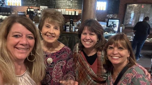 Denise Devine and three women friends at the Esselon Cafe.