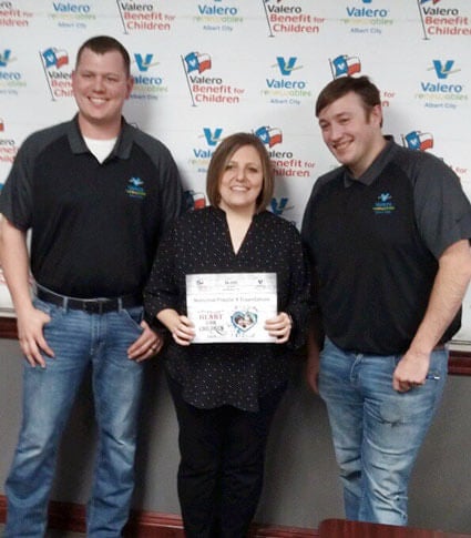 Heartland Chapter Vice President Brenda Slama accepts a $6,200 grant during the 2019 Valero Texas Open Benefit for Children.