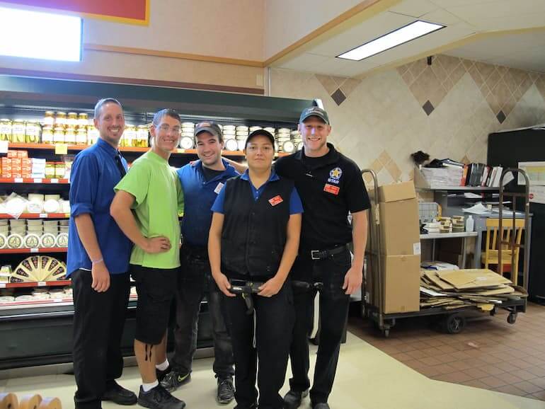 Ian and his friends and co-workers at the grocery store where he works
