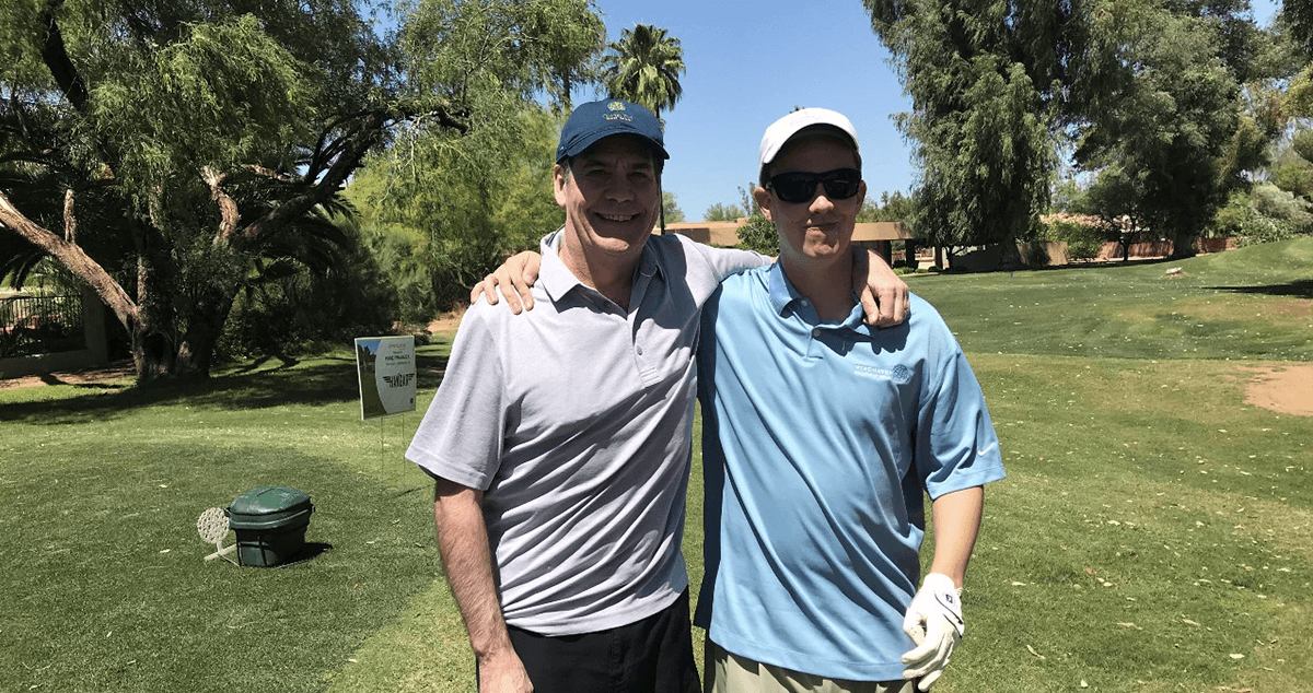 Jay Souder and another gentleman on golf course