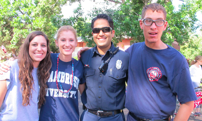 Ian, right, with members of one of his local fire station