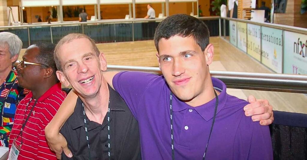 Two young men at the International Fragile X Conference.