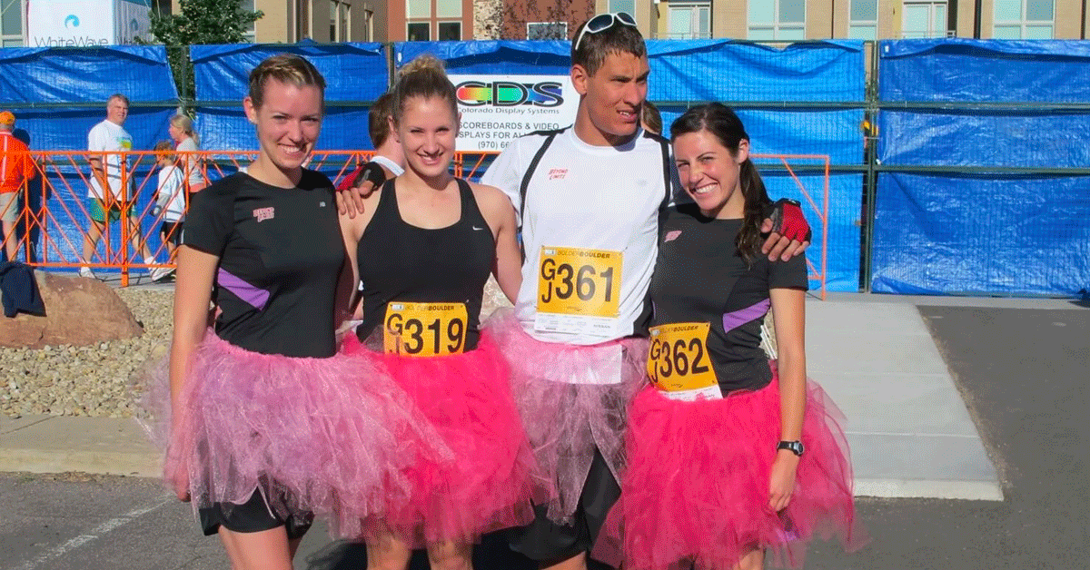 Ian and three other runners wearing pink tutus for the race to spread awareness of Fragile X syndrome.