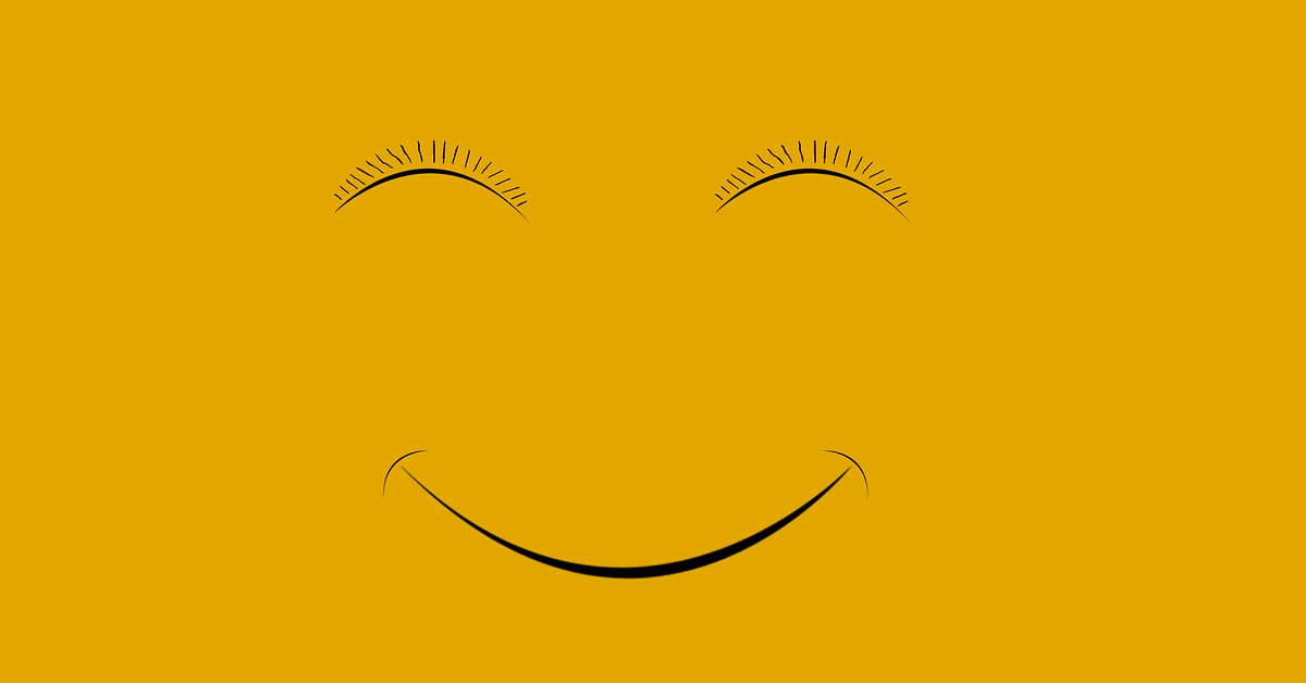Smiling face on a golden background