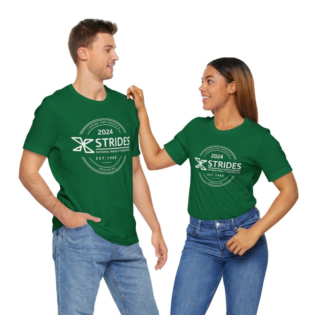 two people wearing green X Strides tshirts